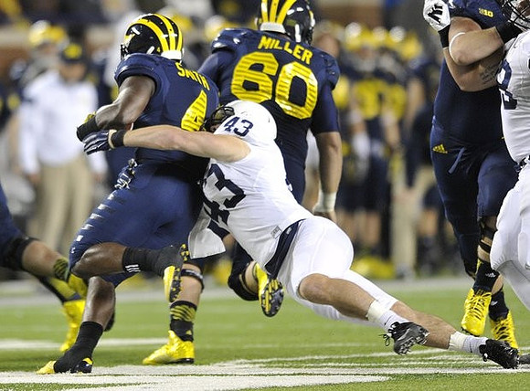 De'Veon Smith (4) and Jack Miller (60)