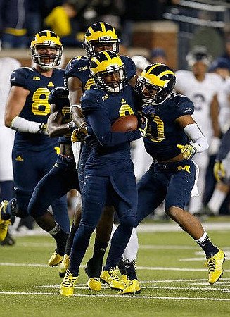 Jake Butt (88) and Blake Countess (2)
