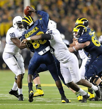 Devin Gardner (98) and Kyle Kalis (67)