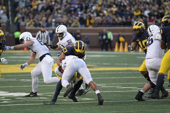 Tyree Kinnel (23), Devin Bush (10), and Rashan Gary (3)