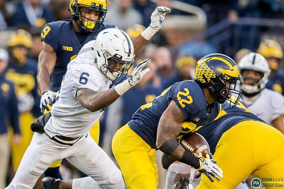 Donovan Peoples-Jones (9) and Karan Higdon (22)