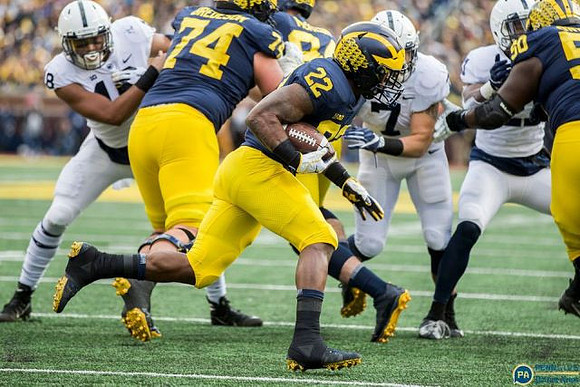 Ben Bredeson (74), Sean McKeon (84), Karan Higdon (22), and Michael Onwenu (50)