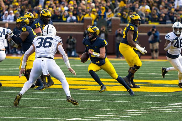 Cesar Ruiz (51), Ben Bredeson (74), Shea Patterson (2), and Juwann Bushell-Beatty (76)
