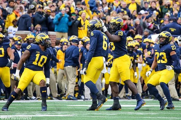 Devin Bush (10), Josh Uche (6), Kwity Paye (19), and Tyree Kinnel (23)