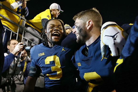Rashan Gary (3) and Shea Patterson (2)