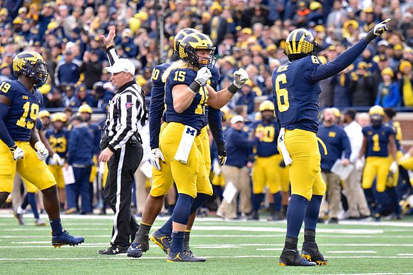 Kwity Paye (19), Devin Bush (10), Chase Winovich (15), and Josh Uche (6)