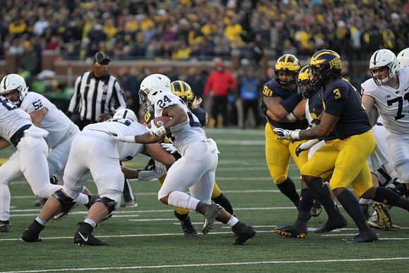 Chase Winovich (15), Bryan Mone (90), and Rashan Gary (3)