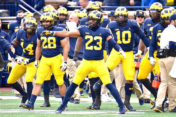 Josh Metellus (14), Brandon Watson (28), Tyree Kinnel (23), and Devin Bush (10)