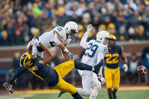 Donovan Peoples-Jones (9) and Karan Higdon (22)