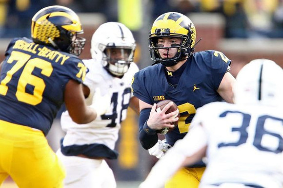 Juwann Bushell-Beatty (76) and Shea Patterson (2)