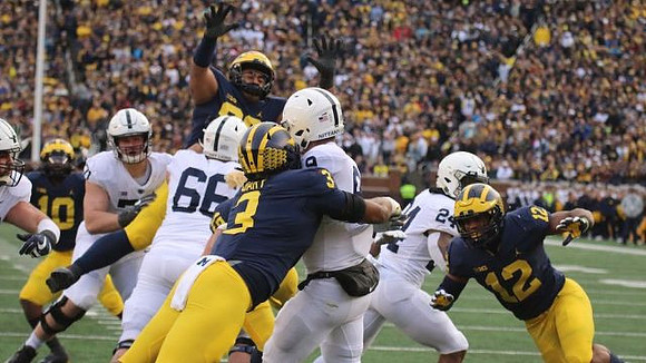 Devin Bush (10), Lawrence Marshall (93), Rashan Gary (3), and Josh Ross (12)