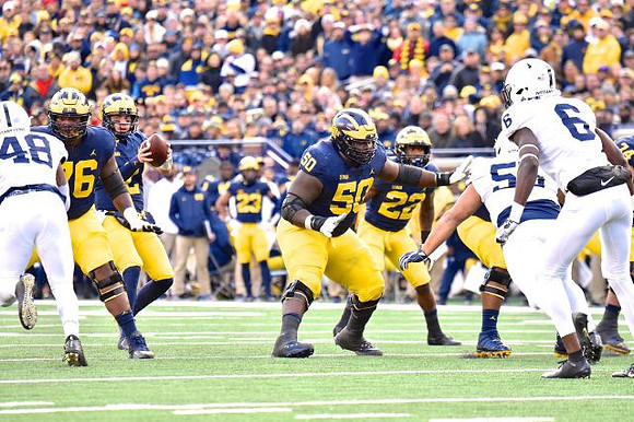 Juwann Bushell-Beatty (76), Shea Patterson (2), Michael Onwenu (50), and Karan Higdon (22)