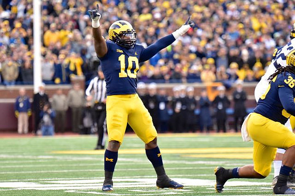 Devin Bush (10) and Devin Gil (36)