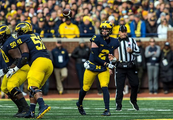 Michael Onwenu (50), Cesar Ruiz (51), and Shea Patterson (2)