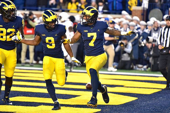 Nick Eubanks (82), Donovan Peoples-Jones (9), and Tarik Black (7)