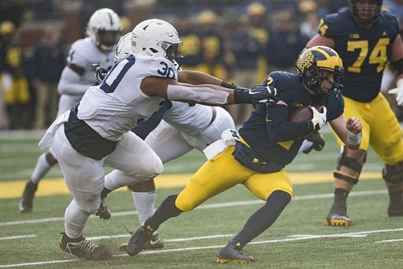 Shea Patterson (2) and Ben Bredeson (74)