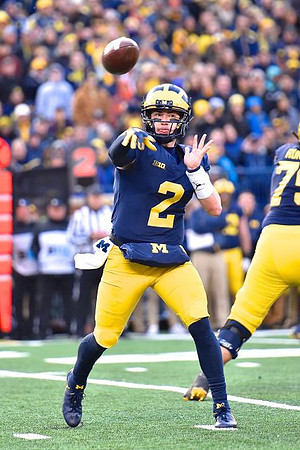Shea Patterson (2) and Jon Runyan Jr. (75)