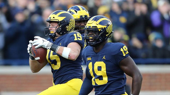 Chase Winovich (15) and Kwity Paye (19)