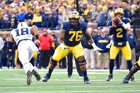 Juwann Bushell-Beatty (76) and Shea Patterson (2)