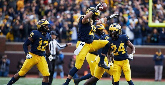 Josh Ross (12), Chase Winovich (15), Kwity Paye (19), and Lavert Hill (24)