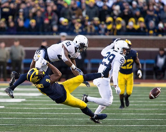 Donovan Peoples-Jones (9) and Karan Higdon (22)