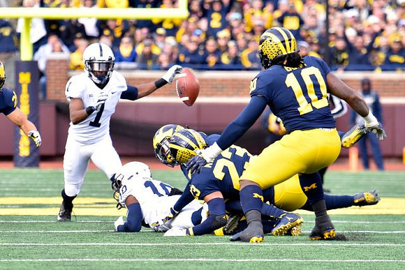 Tyree Kinnel (23) and Devin Bush (10)