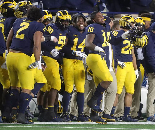 Rashan Gary (3), Carlo Kemp (2), Michael Dwumfour (50), Josh Metellus (14), Devin Bush (10), and Brandon Watson (28)