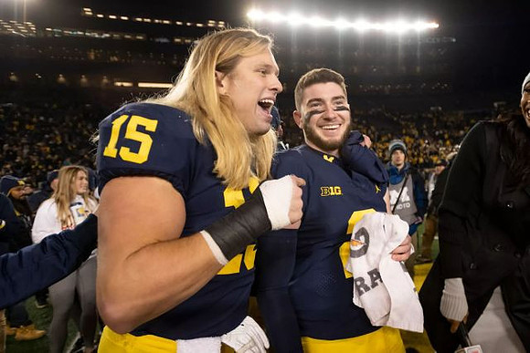 Chase Winovich (15) and Shea Patterson (2)