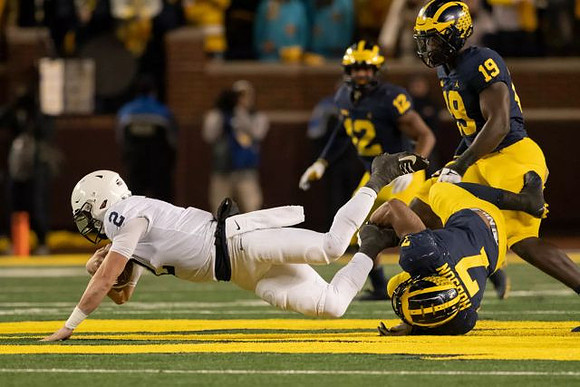 Josh Ross (12), Kwity Paye (19), and Khaleke Hudson (7)