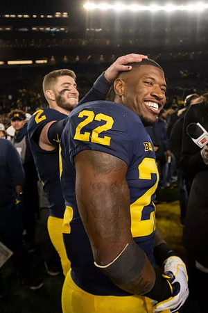 Shea Patterson (2) and Karan Higdon (22)