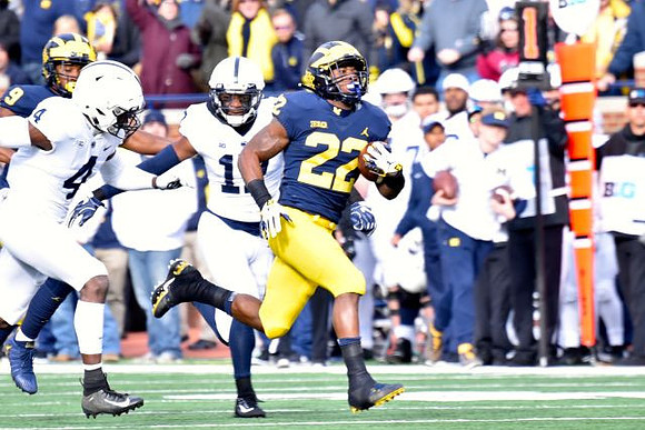 Donovan Peoples-Jones (9) and Karan Higdon (22)