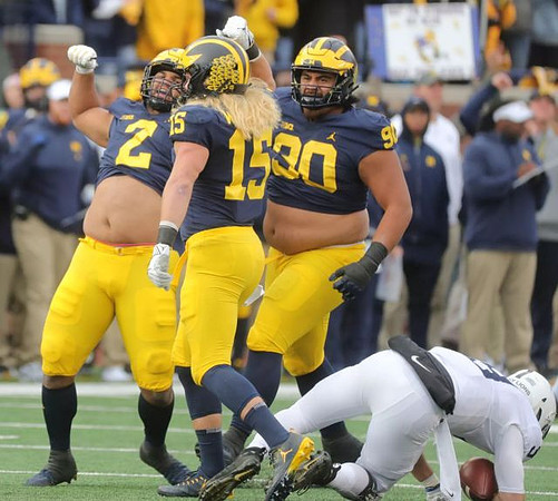 Carlo Kemp (2), Chase Winovich (15), and Bryan Mone (90)