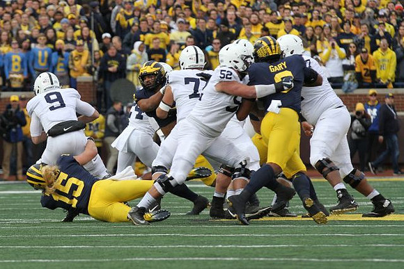 Chase Winovich (15), Carlo Kemp (2), and Rashan Gary (3)