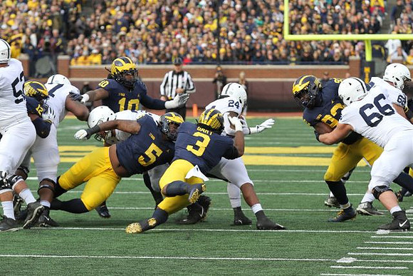 Josh Ross (12), Devin Bush (10), Aubrey Solomon (5), Rashan Gary (3), and Lawrence Marshall (93)