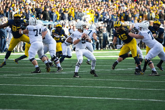 Lawrence Marshall (93), David Long (22), and Chase Winovich (15)