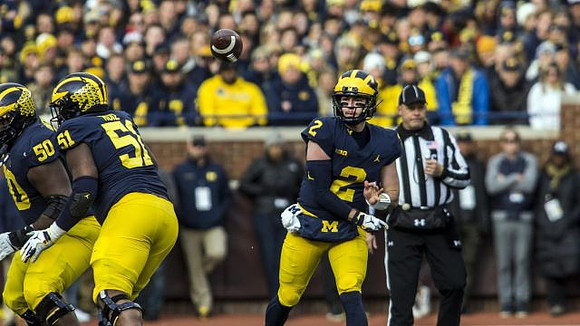 Michael Onwenu (50), Cesar Ruiz (51), and Shea Patterson (2)