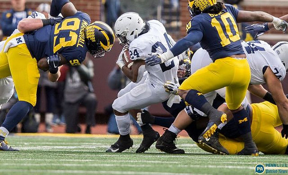 Lawrence Marshall (93) and Devin Bush (10)
