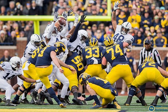 Juwann Bushell-Beatty (76), Quinn Nordin (3), Michael Onwenu (50), Camaron Cheeseman (33), Will Hart (17), Ben Bredeson (74), and Stephen Spanellis (72)