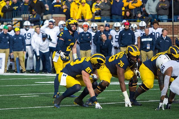 Shea Patterson (2), Zach Gentry (83), Juwann Bushell-Beatty (76), and Michael Onwenu (50)
