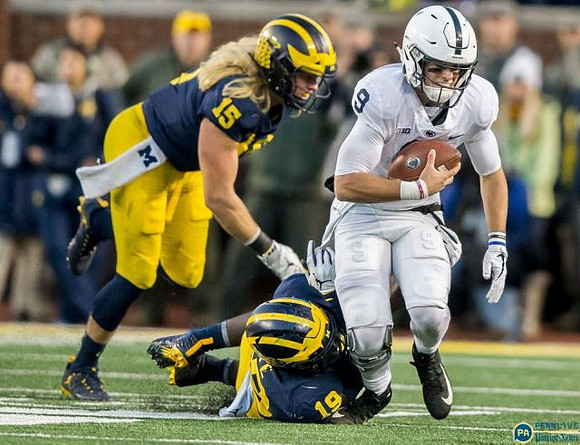 Chase Winovich (15) and Kwity Paye (19)