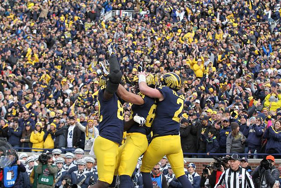 Nick Eubanks (82), Sean McKeon (84), and Shea Patterson (2)