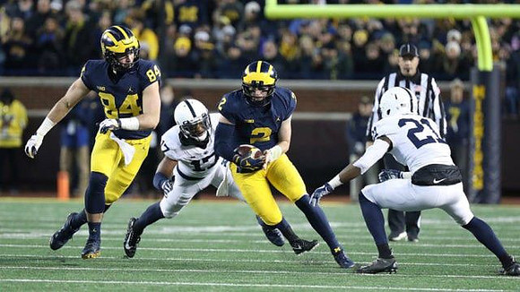 Sean McKeon (84) and Shea Patterson (2)