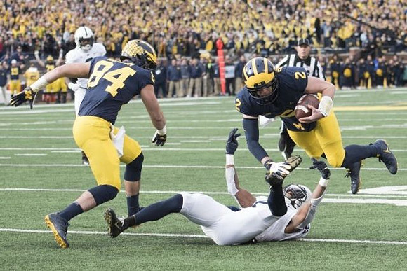 Sean McKeon (84) and Shea Patterson (2)
