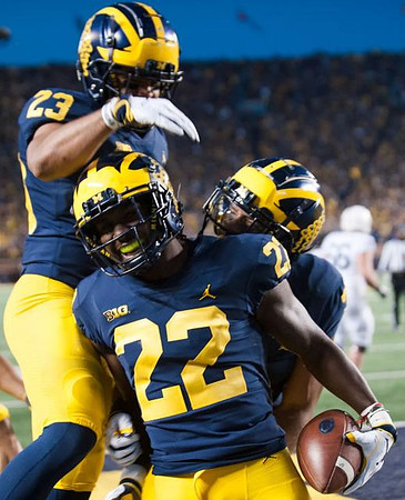 Tyree Kinnel (23) and David Long (22)