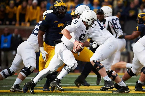 Rashan Gary (3) and Khaleke Hudson (7)