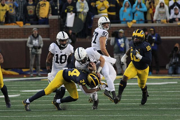 Lavert Hill (24) and Devin Bush (10)