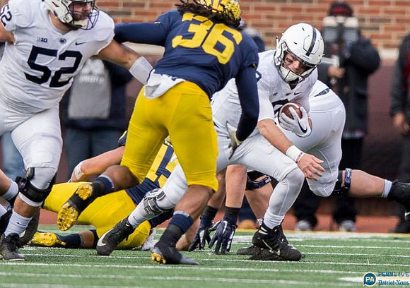 Chase Winovich (15) and Devin Gil (36)