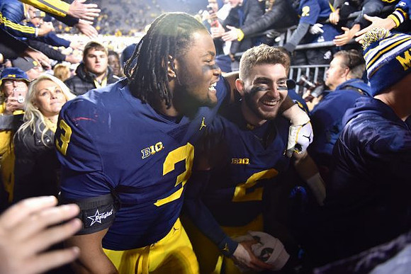 Rashan Gary (3) and Shea Patterson (2)