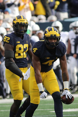 Nick Eubanks (82) and Nico Collins (4)