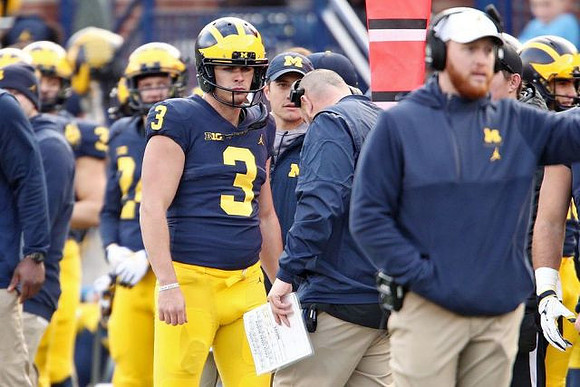 Quinn Nordin (3) and Jay Harbaugh